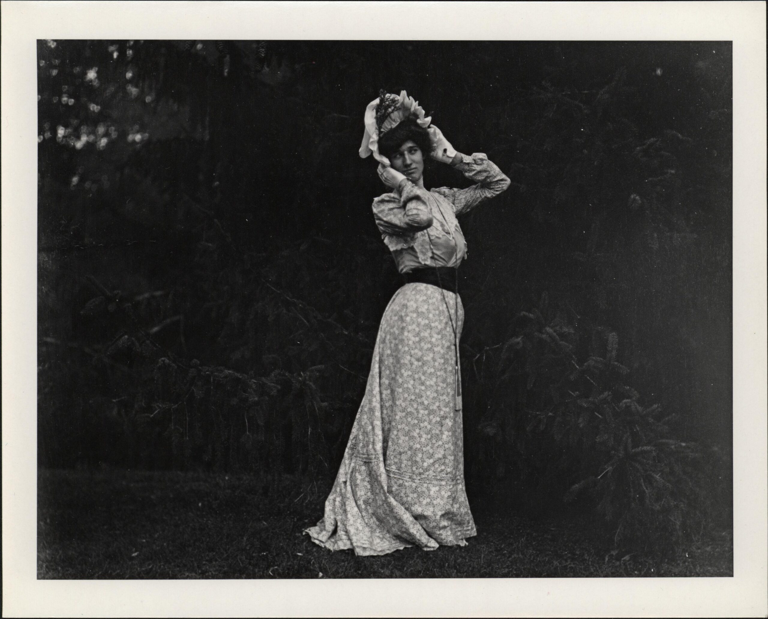 Portrait of Edward Bringhurst III/V posing on the Rockwood South Lawn in a dress