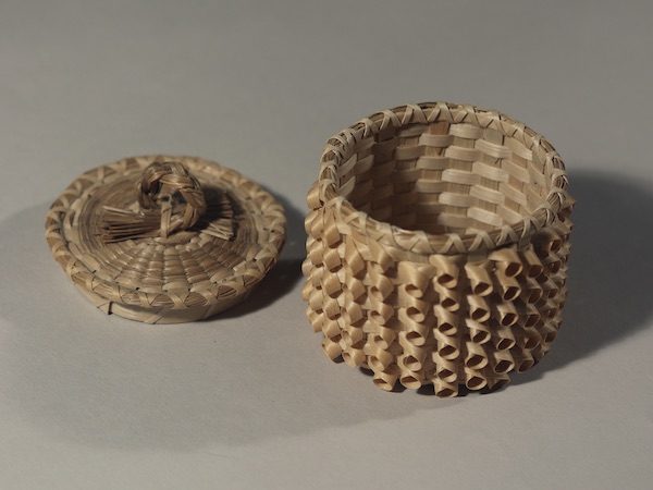 Caron Shay (Penobscot Nation, b. 1946), Lidded Basket, 2002, brown ash and sweetgrass.