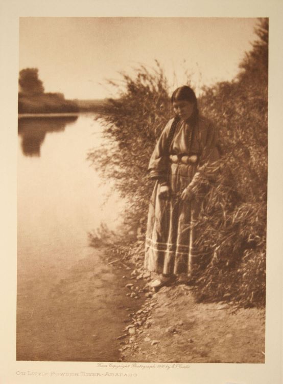 Edward S. Curtis (1868-1952), The Little Powder River Arapaho, 1910, 12 ½ x 9 ½ inches, photogravure. Museums Collections, Gift of Mr. Howard Greenberg.