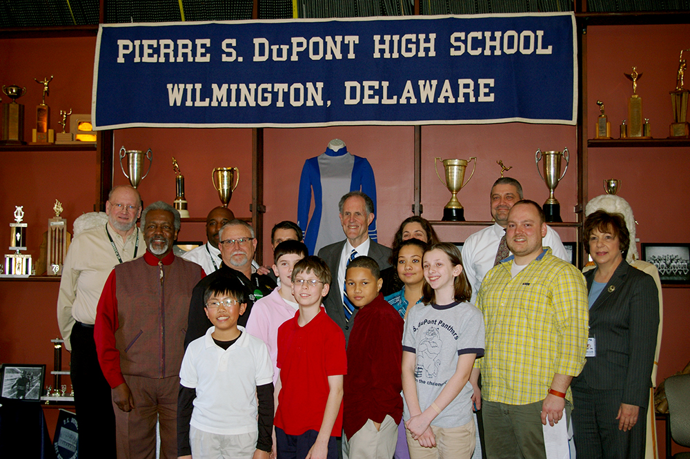 Photograph of Senator Ted Kaufman with students at P.S. duPont Middle School, 2010 March 1
