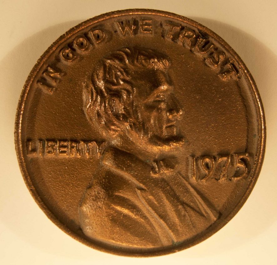 1975 penny paperweight