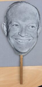 Creator unknown, Dwight D. Eisenhower fan in the shape of Eisenhower’s face, circa 1955, from the Jerome O. Herlihy political campaign ephemera collection