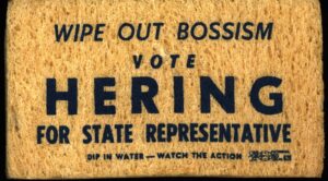 Creator unknown, “Wipe out Bossism, Vote [George C.] Hering [III] for State Representative” sponge, 1966-1972, from the Jerome O. Herlihy political campaign ephemera collection