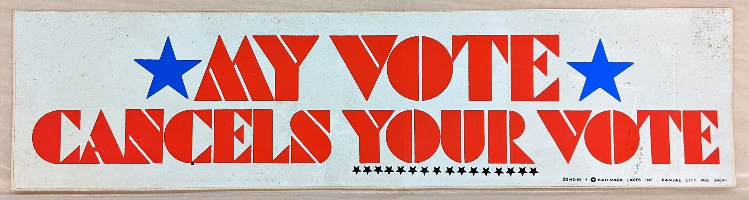 Creator unknown, “My Vote Cancels Your Vote” bumper sticker, from the Jerome O. Herlihy political campaign ephemera collection