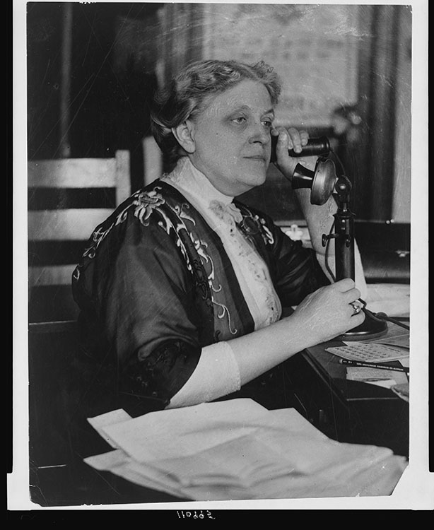 Carrie Chapman Catt, half-length portrait, seated, facing left, on telephone, 1909. National Photo Company collection. Facsimile image courtesy of Library of Congress